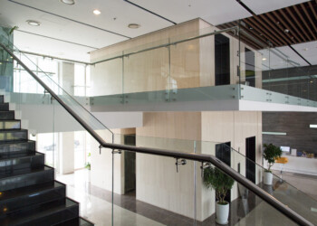 Modern interior design of office building. Empty lobby of condominium building. Two-level house design concept Interior design of modern building
